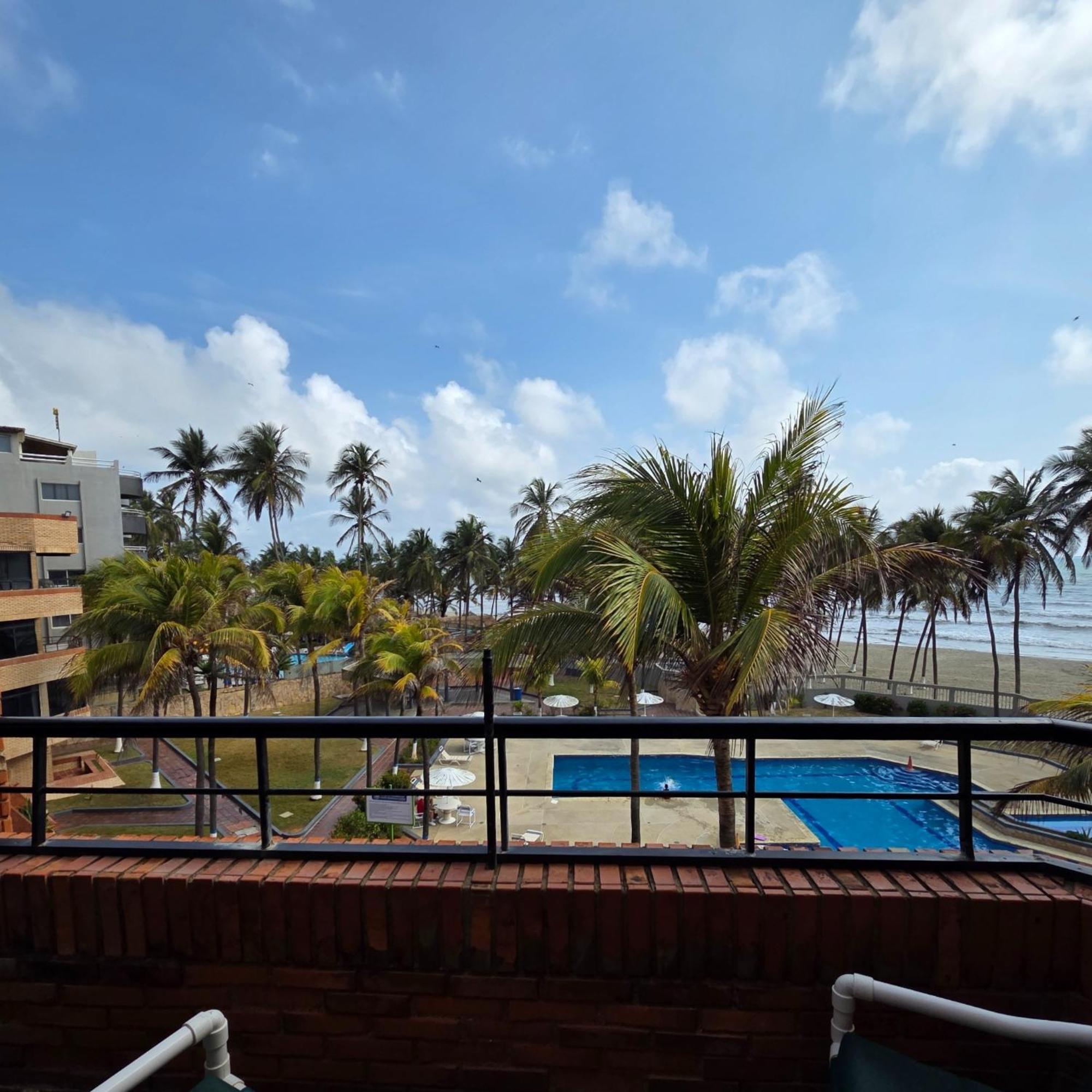Апартаменты Tucacas, Frente Al Mar, Balcon, Piscina Y Playa Privada Экстерьер фото