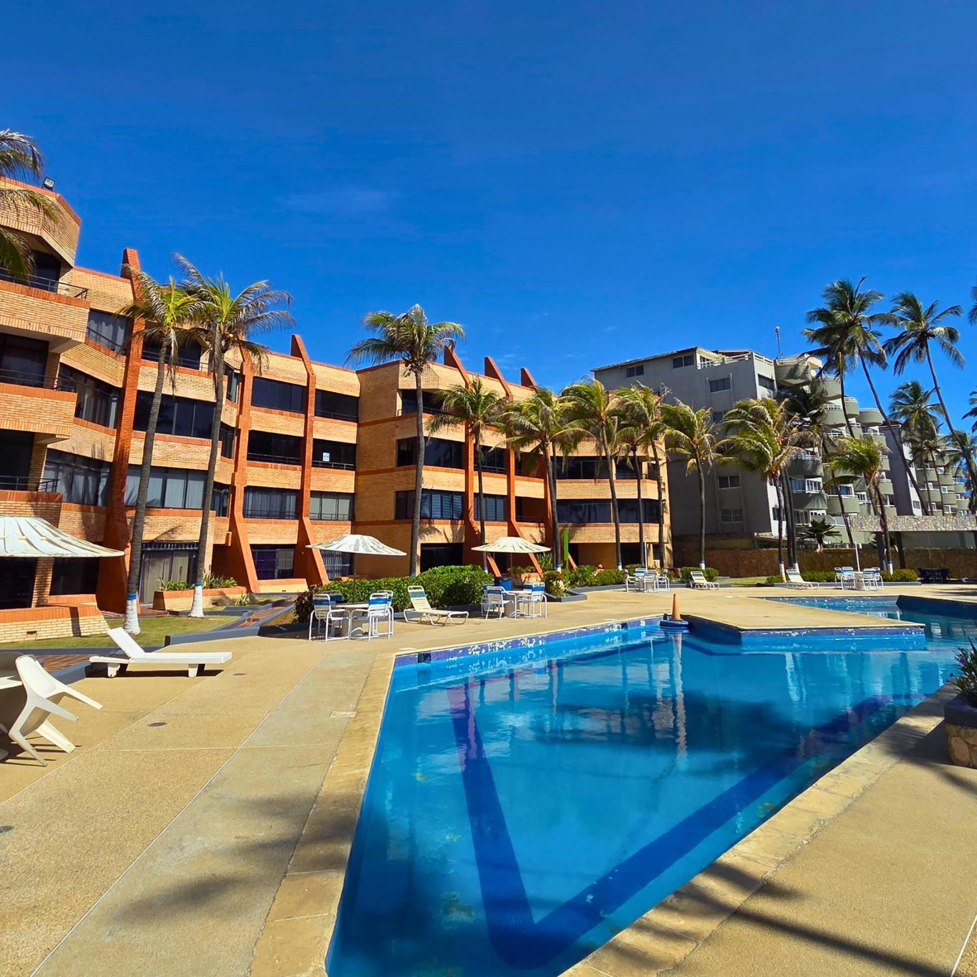 Апартаменты Tucacas, Frente Al Mar, Balcon, Piscina Y Playa Privada Экстерьер фото