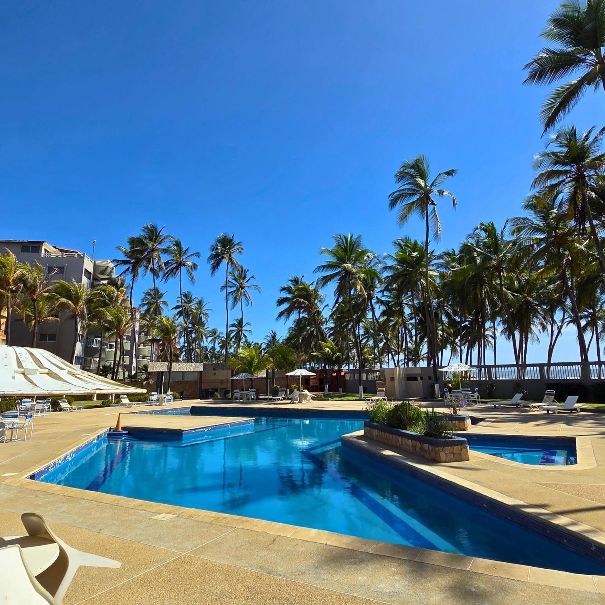 Апартаменты Tucacas, Frente Al Mar, Balcon, Piscina Y Playa Privada Экстерьер фото